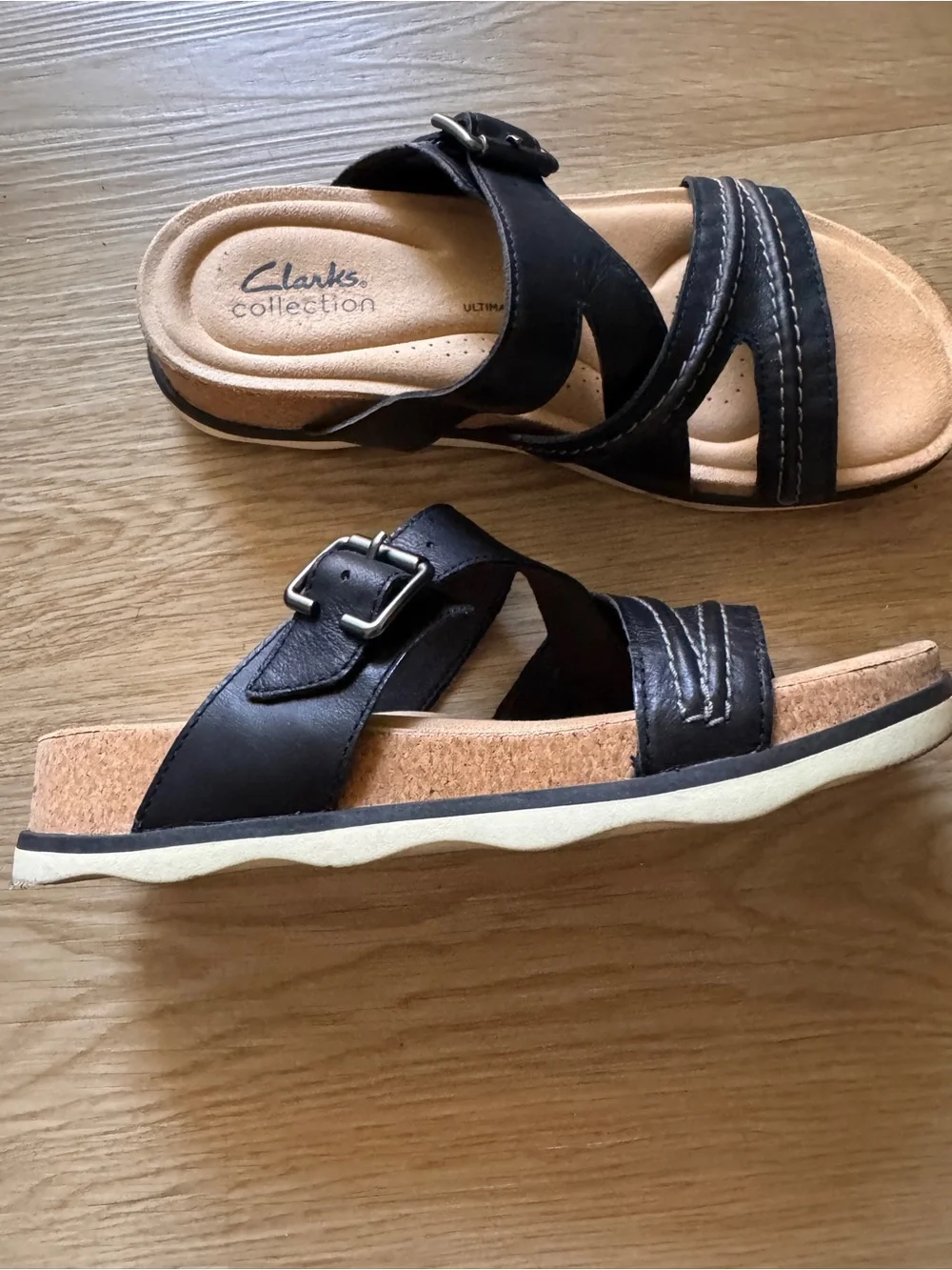 Clarks Black Leather Slip-On Sandals with Buckle